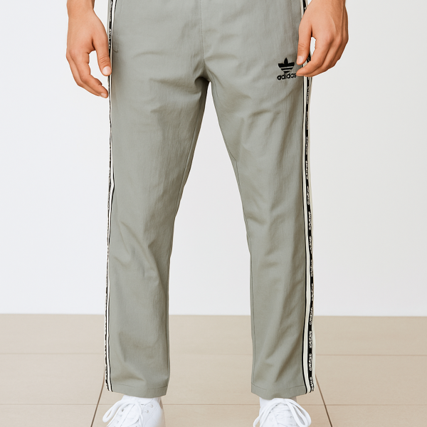 Adidas Men’s Track Pants with Side Logo Tape – Sporty Comfort & Iconic Style